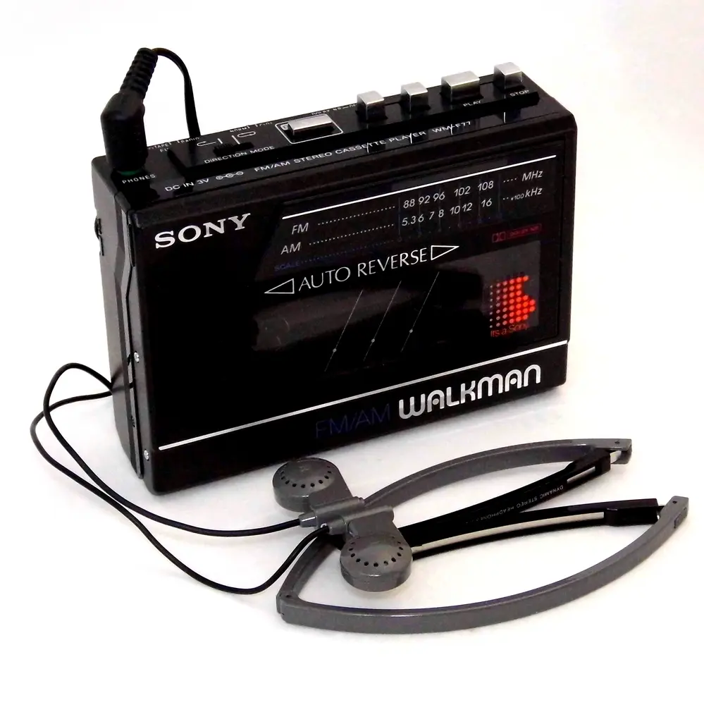 Sony Walkman WM-F77 with its headphones